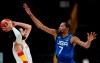 United States' Kevin Durant (7), right, tries to block Spain's Ricky Rubio (9), left, during men's basketball quarterfinal game at the 2020 Summer Olympics, Tuesday, Aug. 3, 2021, in Saitama, Japan. (AP Photo/Charlie Neibergall)