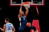 France's Rudy Gobert (27) scores over Italy's Achille Polonara (33) during a men's basketball quarterfinal round game at the 2020 Summer Olympics, Tuesday, Aug. 3, 2021, in Saitama, Japan. (AP Photo/Eric Gay)