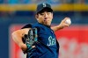 Seattle Mariners starting pitcher Yusei Kikuchi, of Japan, delivers to the Tampa Bay Rays during the first inning of a baseball game Tuesday, Aug. 3, 2021, in St. Petersburg, Fla. (AP Photo/Chris O'Meara)