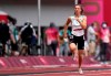 FILE In this file photo taken on Friday, July 30, 2021, Krystsina Tsimanouskaya, of Belarus, runs in action in the women's 100-meter race at the 2020 Summer Olympics. A feud between Tsimanouskaya and team officials that prompted her to seek refuge in Poland has again cast a spotlight on the repressive environment in the ex-Soviet nation, where authorities have unleashed a relentless crackdown on dissent. (AP Photo/Petr David Josek, File)