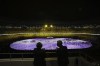 World Health Organization Director-General Tedros Adhanom Ghebreyesus, left, and United Nations High Commissioner for Refugees Filippo Grandi watch the opening ceremony in the Olympic Stadium at the 2020 Summer Olympics, Friday, July 23, 2021, in Tokyo, Japan. (Leon Neal/Pool Photo via AP)