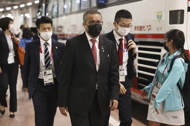 World Health Organization Director-General Tedros Adhanom Ghebreyesus arrives at the opening ceremony in the Olympic Stadium at the 2020 Summer Olympics, Friday, July 23, 2021, in Tokyo, Japan. (Leon Neal/Pool Photo via AP)