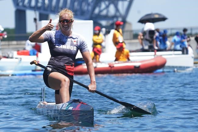 Laurence Vincent-Lapointe, of Canada, reacts after completing the canoe sprint women's C-1 200m A finals at the 2020 Summer Olympics, Thursday, Aug. 5, 2021, in Tokyo, Japan. Vincent-Lapointe finished second to win the silver medal. The 29-year-old paddler from Trois-Rivieres, Que., finished the sprint in a time of 46.786 seconds, behind American Nevin Harrison. THE CANADIAN PRESS/Nathan Denette