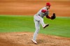 Los Angeles Angels starting pitcher Shohei Ohtani follows through on his delivery to the Texas Rangers in the sixth inning of a baseball game in Arlington, Texas, Wednesday, Aug. 4, 2021. (AP Photo/Tony Gutierrez)