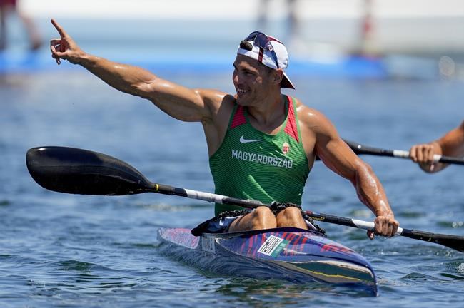 Sandor Totka, Hungary, reacts after finish first in men's kayak single 200m final A to win the gold medal at the 2020 Summer Olympics, Thursday, Aug. 5, 2021, in Tokyo, Japan. (AP Photo/Lee Jin-man)