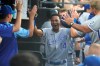 Kansas City Royals' Edward Olivares celebrates in the dugout his home run off Chicago White Sox starting pitcher Lucas Giolito during the second inning of a baseball game Wednesday, Aug. 4, 2021, in Chicago. (AP Photo/Charles Rex Arbogast)