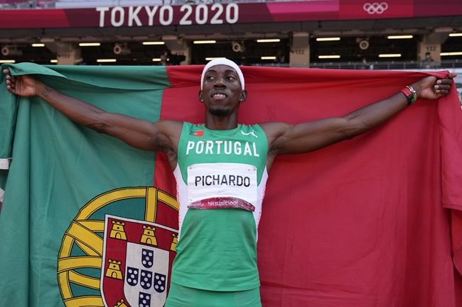 Pedro Pichardo, of Portugal, celebrates after winning the final of the men's triple jump at the 2020 Summer Olympics, Thursday, Aug. 5, 2021, in Tokyo. (AP Photo/David J. Phillip)