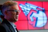 Cleveland Indians owner Paul Dolan speaks to the media as the new Indians logo is displayed, Friday, July 23, 2021, in Cleveland. Known as the Indians since 1915, Cleveland's Major League Baseball team will be called Guardians. The ballclub announced the name change Friday, effective at the end of the 2021 season. (AP Photo/Tony Dejak)