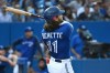 Blue Jays shortstop Bo Bichette (11) watches his two-run home run, which scored teammate Vladimir Guerrero Jr., during fourth-inning AL baseball game action against Cleveland in Toronto on Thursday Aug. 5, 2021. THE CANADIAN PRESS/Jon Blacker