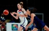 Serbia's Jelena Brooks (9), right, tries to steal the ball from United States' Breanna Stewart (10) during women's basketball semifinal game at the 2020 Summer Olympics, Friday, Aug. 6, 2021, in Saitama, Japan. (AP Photo/Charlie Neibergall)