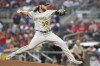 Milwaukee Brewers starting pitcher Corbin Burnes throws to an Atlanta Braves batter during the first inning of a baseball game Friday, July 30, 2021, in Atlanta. (AP Photo/Hakim Wright Sr.)