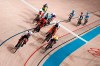 Athletes compete during the track cycling women's madison race at the 2020 Summer Olympics, Friday, Aug. 6, 2021, in Izu, Japan. (AP Photo/Thibault Camus)