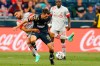 Philadelphia Union midfielder Leon Flach, right, battles for the ball against Toronto FC midfielder Jonathan Osorio, left, during the first half of an MLS soccer match, Wednesday, Aug. 4, 2021, in Chester, Pa. THE CANADIAN PRESS/AP/Christopher Szagola