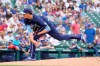 Chicago Cubs starting pitcher Kyle Hendricks follows through during the first inning of a baseball game against the Chicago White Sox, Friday, Aug. 6, 2021, in Chicago. (AP Photo/Charles Rex Arbogast)