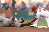 Los Angeles Angels shortstop Jose Iglesias, right, tags out Oakland Athletics' Ramon Laureano during the first inning of a baseball game in Anaheim, Calif., Thursday, July 29, 2021. (AP Photo/Kelvin Kuo)