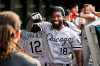 Chicago White Sox's Brian Goodwin celebrates in the dugout after his two-run home run off Chicago Cubs relief pitcher Manuel Rodriguez during the 10th inning of a baseball game Friday, Aug. 6, 2021, in Chicago. (AP Photo/Charles Rex Arbogast)