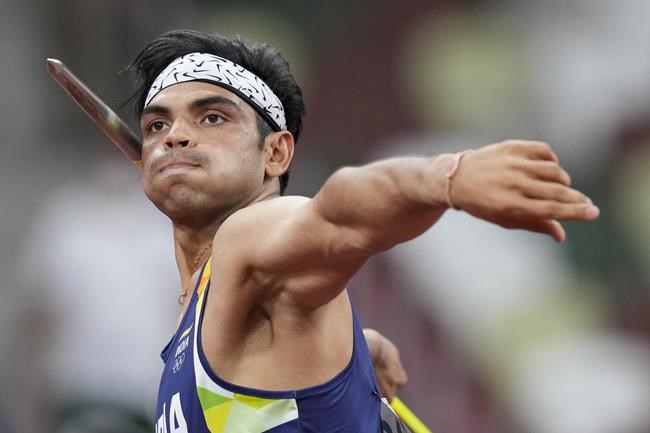 Neeraj Chopra, of India, competes in the men's javelin throw final at the 2020 Summer Olympics, Saturday, Aug. 7, 2021, in Tokyo. (AP Photo/Matthias Schrader)