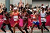 Fans watches as runners compete during the men's marathon at the 2020 Summer Olympics, Sunday, Aug. 8, 2021, in Sapporo, Japan. THE CANADIAN PRESS/AP-Eugene Hoshiko
