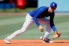 Los Angeles Dodgers second baseman Trea Turner takes infield practice before the team's baseball game against the Los Angeles Angels in Los Angeles, Saturday, Aug. 7, 2021. (AP Photo/Alex Gallardo)