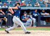 Seattle Mariners' Kyle Seager follows through on double against the New York Yankees during the eighth inning of a baseball game Sunday, Aug. 8, 2021, in New York. (AP Photo/Noah K. Murray)