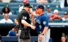 Seattle Mariners manager Scott Servais (9) argues with umpire Lance Barrett (16) before being ejected during the eighth inning of a baseball game against the New York Yankees, Sunday, Aug. 8, 2021, in New York. (AP Photo/Noah K. Murray)