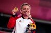 Gold medallist Kelsey Mitchell, of Team Canada, reacts during a medal ceremony for the track cycling women's sprint race at the 2020 Summer Olympics, Sunday, Aug. 8, 2021, in Izu, Japan. THE CANADIAN PRESS/AP-Christophe Ena