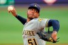 Milwaukee Brewers starting pitcher Freddy Peralta delivers during the second inning of the team's baseball game against the Pittsburgh Pirates in Pittsburgh, Thursday, July 29, 2021. (AP Photo/Gene J. Puskar)
