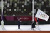 Paris mayor Anne Hidalgo, right, holds the Olympic flag next International Olympic Committee's President Thomas Bach, center, and Tokyo Gov. Yuriko Koike, left, during the closing ceremony in the Olympic Stadium at the 2020 Summer Olympics, Sunday, Aug. 8, 2021, in Tokyo, Japan. (AP Photo/Lee Jin-man)