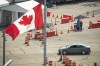 A car crosses the border into Canada, in Niagara Falls, Ont., on Monday, August 9, 2021. American citizens and permanent residents are now allowed to enter Canada for non-essential purposes if they can provide proof that they’ve been fully vaccinated for at least 14 days.THE CANADIAN PRESS/Eduardo Lima