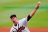 Atlanta Braves starter Drew Smyly releases a pitch during the first inning of the team's baseball game against the Cincinnati Reds on Tuesday, Aug. 10, 2021, in Atlanta. (AP Photo/John Bazemore)