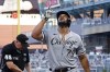Chicago White Sox's Jose Abreu (79) points skyward following his solo home run off Minnesota Twins pitcher Griffin Jax during the third inning of a baseball game Tuesday, Aug. 10, 2021, in Minneapolis. (AP Photo/Jim Mone)