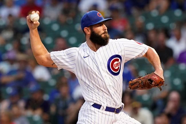 Chicago Cubs starting pitcher Jake Arrieta throws to a Milwaukee Brewers batter during the first inning of a baseball game in Chicago, Wednesday, Aug. 11, 2021. (AP Photo/Nam Y. Huh)