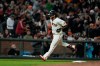 San Francisco Giants' Brandon Crawford rounds third base after hitting a solo home run against the Arizona Diamondbacks during the seventh inning of a baseball game Wednesday, Aug. 11, 2021, in San Francisco. (AP Photo/Tony Avelar)