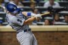 Los Angeles Dodgers' Will Smith follows through on a two-run home run during the 10th inning of the team's baseball game against the New York Mets on Friday, Aug. 13, 2021, in New York. (AP Photo/Frank Franklin II)