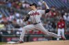 Atlanta Braves starting pitcher Max Fried throws during the first inning of the team's baseball game against the Washington Nationals at Nationals Park, Saturday, Aug. 14, 2021, in Washington. (AP Photo/Alex Brandon)