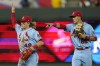 St. Louis Cardinals' Harrison Bader (48) and Lars Nootbaar (68) celebrate after thier baseball game against the Kansas City Royals Saturday, Aug. 14, 2021, in Kansas City, Mo. The Cardinals won 9-4. (AP Photo/Charlie Riedel)