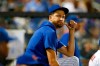 New York Mets pitcher Jacob deGrom watches play against the Los Angeles Dodgers during the seventh inning of a baseball game Saturday, Aug. 14, 2021, in New York. (AP Photo/Noah K. Murray)