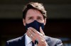 Prime Minister Justin Trudeau puts his mask on after speaking to media following a meeting with Governor General Mary Simon at Rideau Hall in Ottawa, on Sunday, Aug. 15, 2021. THE CANADIAN PRESS/Sean Kilpatrick