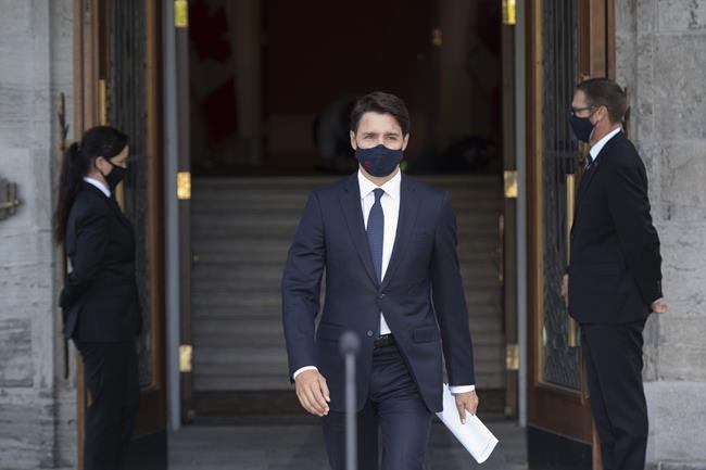 Prime Minister Justin Trudeau walks to the lectern as he leaves Rideau Hall after meeting with Governor General Mary Simon to ask her to dissolve Parliament, triggering an election, in Ottawa, on Sunday, Aug. 15, 2021. THE CANADIAN PRESS/Justin Tang