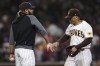 San Diego Padres' Fernando Tatis Jr., left, celebrates with Trent Grisham after the team defeated the Miami Marlins in a baseball game Monday, Aug. 9, 2021, in San Diego. (AP Photo/Derrick Tuskan)