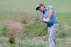 Kevin Kisner hits out of the rough on the eighth hole during the final round of the Wyndham Championship golf tournament at Sedgefield Country Club in Greensboro, N.C., Sunday, Aug. 15, 2021. (AP Photo/Chris Seward)