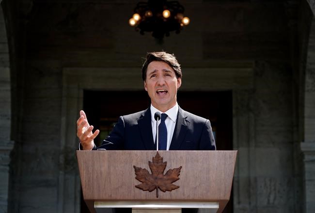 Prime Minister Justin Trudeau speaks to media following a meeting with Governor General Mary Simon at Rideau Hall in Ottawa, Sunday, Aug. 15, 2021. New survey results suggest Justin Trudeau's Liberals are the top choice of Canadians to lead an economic recovery from the COVID-19 pandemic. THE CANADIAN PRESS/Sean Kilpatrick