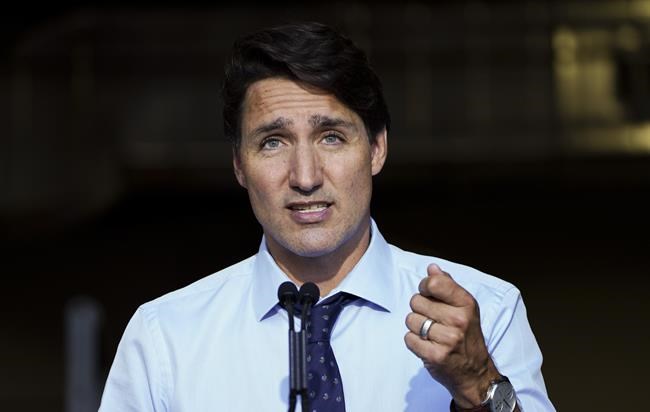 Liberal Leader Justin Trudeau holds an election campaign event in Longueuil, Que., Monday, Aug. 16, 2021. New survey results suggest Justin Trudeau's Liberals were clinging to a five-point lead on the eve of the federal election campaign. THE CANADIAN PRESS/Sean Kilpatrick