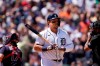 Detroit Tigers designated hitter Miguel Cabrera walks to the dugout after striking out during the first inning of a baseball game against the Cleveland Indians, Sunday, Aug. 15, 2021, in Detroit. (AP Photo/Carlos Osorio)