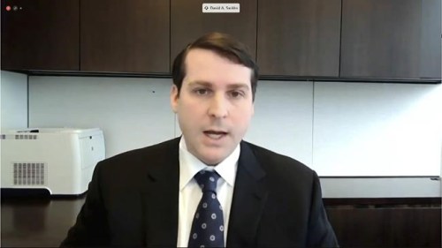 FILE - In this image from House Television on Dec. 17, 2020, David Sackler, a member of the family that owns Purdue Pharma testifies via video to a House Oversight Committee hearing.  Sackler has told a court that the family will not contribute billions to abate the U.S. opioid crisis unless it is granted protection from current and future lawsuits.  Sackler made a rare public appearance Tuesday, Aug. 17, 2021, when he testified at a bankruptcy court hearing over the company's restructuring plan. (House Television via AP, File)