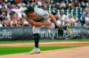 Oakland Athletics starting pitcher Chris Bassitt follows through during the first inning of a baseball game against the Chicago White Sox, Tuesday, Aug. 17, 2021, in Chicago. (AP Photo/Charles Rex Arbogast)