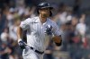 New York Yankees' Giancarlo Stanton runs to first base for an RBI single during the fifth inning of a baseball game against the Boston Red Sox on Tuesday, Aug. 17, 2021, in New York. (AP Photo/Frank Franklin II)