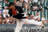 Chicago White Sox starting pitcher Reynaldo Lopez follows through during the first inning of a baseball game against the Oakland Athletics, Tuesday, Aug. 17, 2021, in Chicago. (AP Photo/Charles Rex Arbogast)