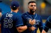 Tampa Bay Rays' Nelson Cruz celebrates with Ji-Man Choi (26) after the Rays defeated the Baltimore Orioles during a baseball game Tuesday, Aug. 17, 2021, in St. Petersburg, Fla. (AP Photo/Chris O'Meara)