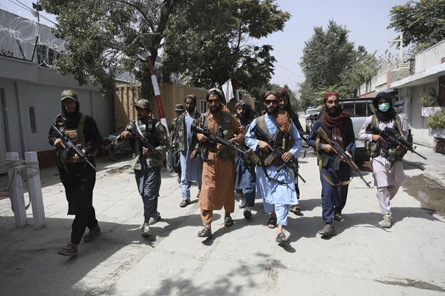 Taliban fighters patrol in the Wazir Akbar Khan neighborhood in the city of Kabul, Afghanistan, Wednesday, Aug. 18, 2021. The Taliban declared an